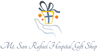 Ad of a hand holding a gift box. Ad says:
Mt. San Rafael Hospital Gift Shop